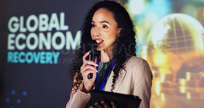 Buy stock photo Woman, mic and tablet at conference, stage and discussion at seminar for global economy recovery. Person, analyst and event with speech, info and feedback at international convention for presentation