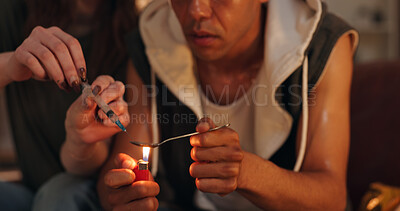 Buy stock photo Spoon, needle and couple with drugs in home for narcotics, illegal and substance abuse together. Opioid, injection and people burning heroin in syringe for addiction, danger and dependency crisis