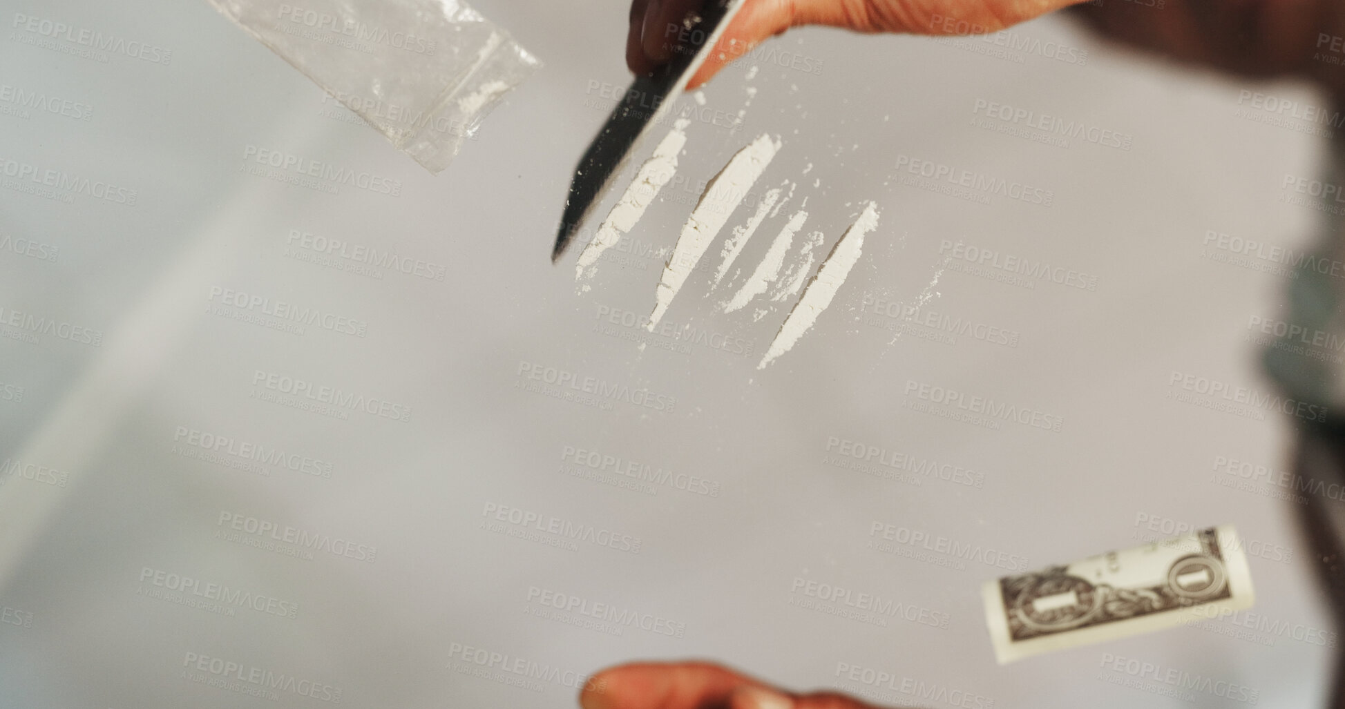 Buy stock photo Person, lines and hands with cocaine, low angle and illegal substance with bad habit. Overdose, cutting and home with closeup, addiction and routine with crime, rehabilitation and credit card