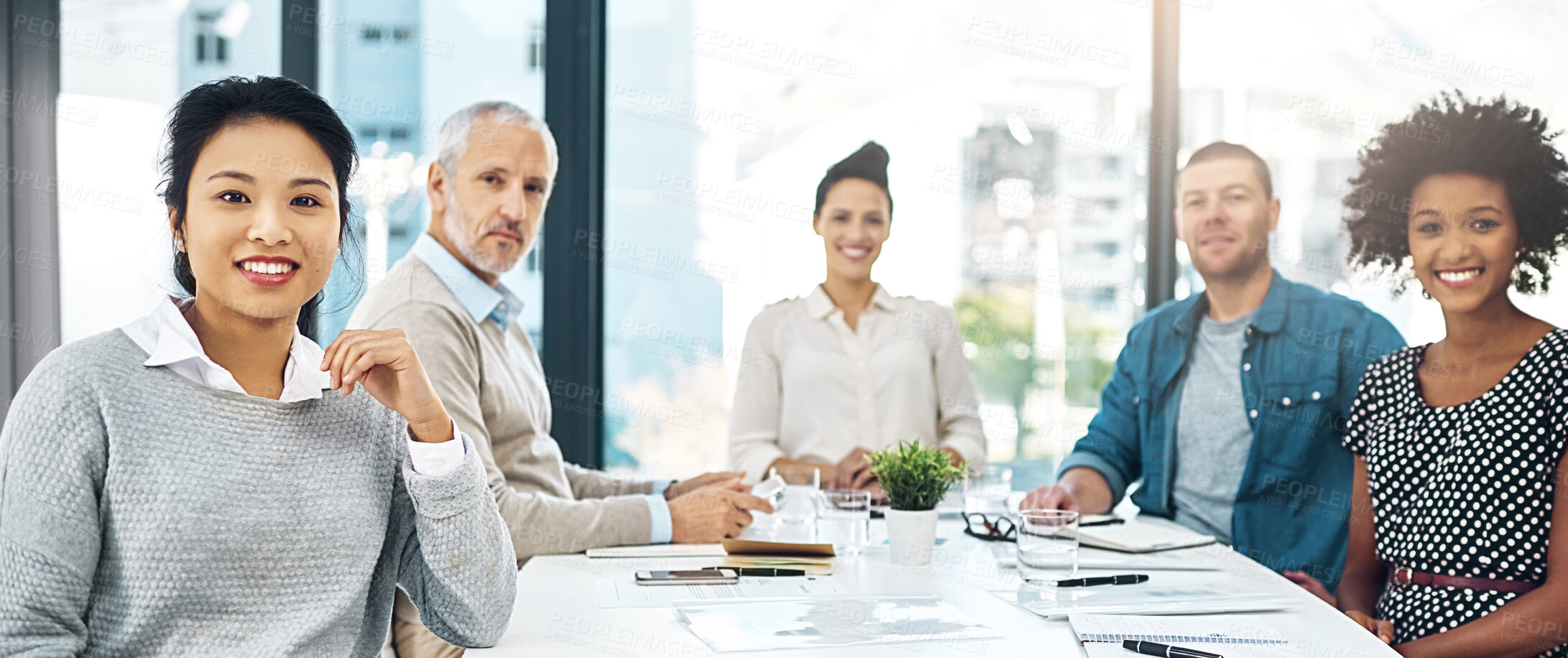 Buy stock photo Portrait of a group of businesspeople having a meeting in a modern office