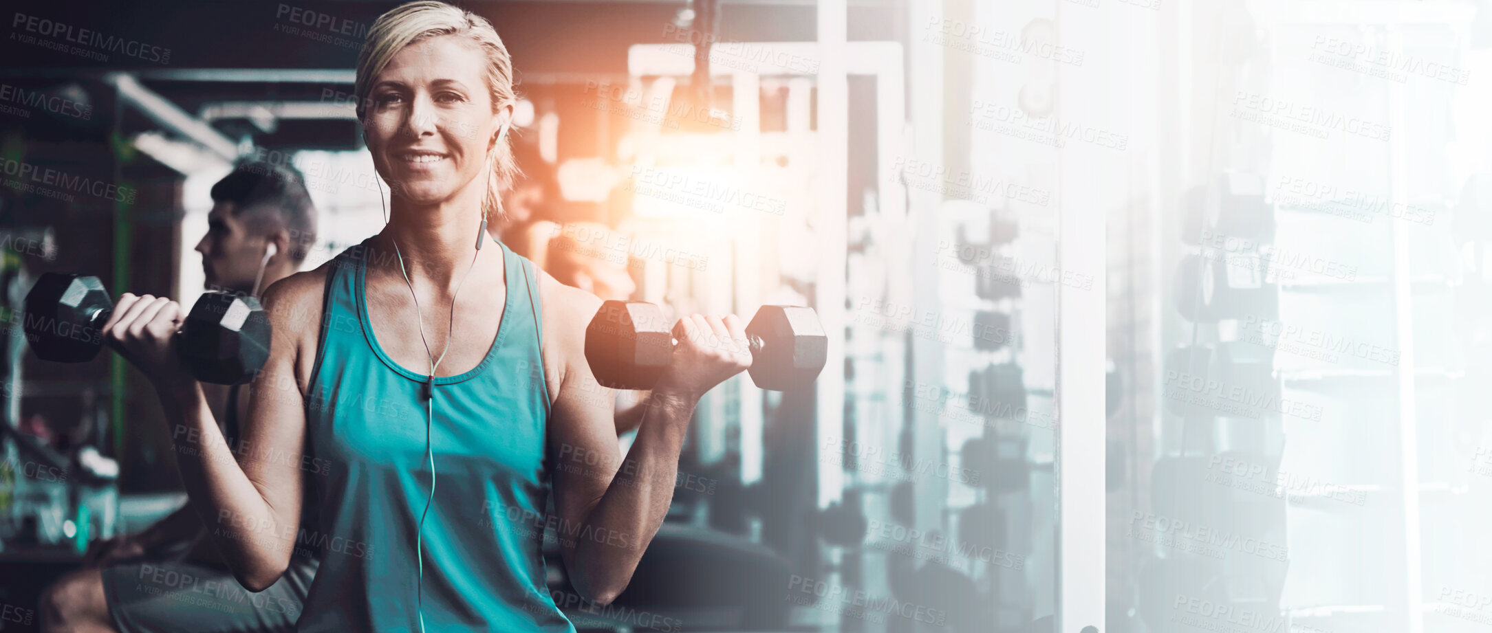 Buy stock photo Shot of a woman doing a upper-body workout at the gym