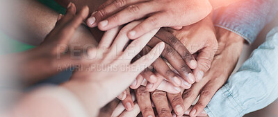 Buy stock photo High angle shot of university students' hands in a huddle