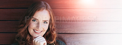 Buy stock photo Portrait of an attractive young woman posing against a wooden wall