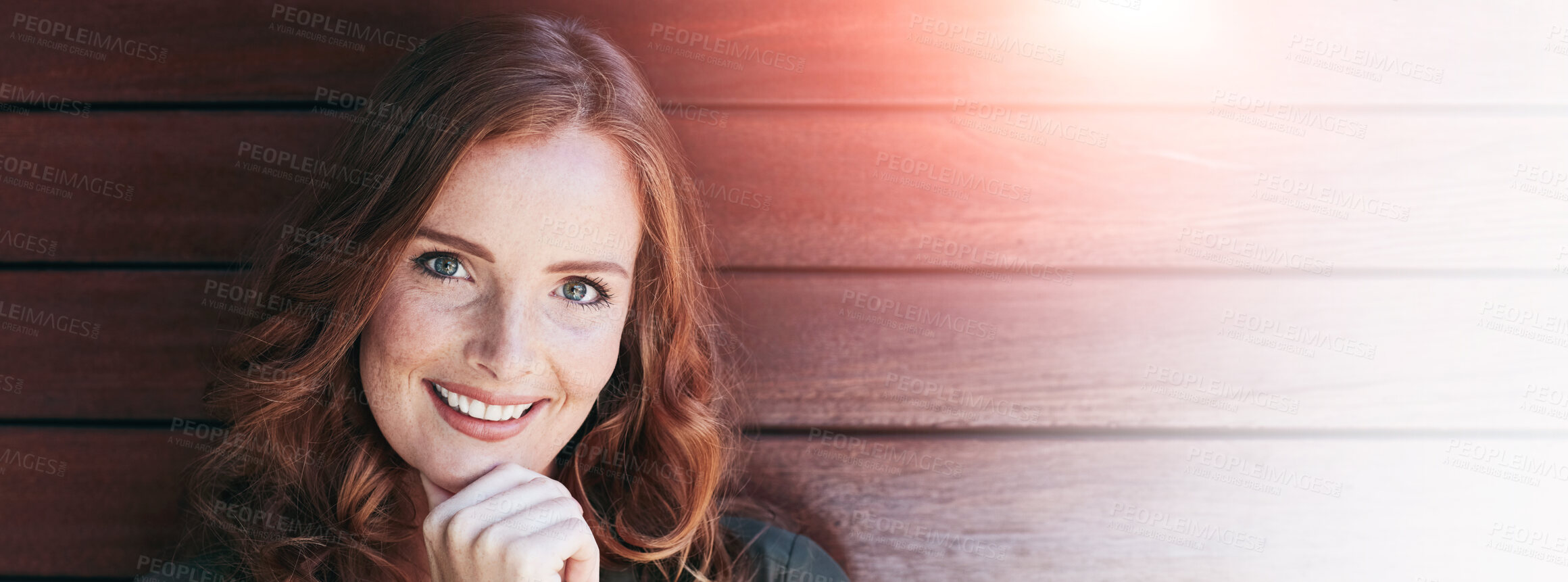 Buy stock photo Portrait of an attractive young woman posing against a wooden wall