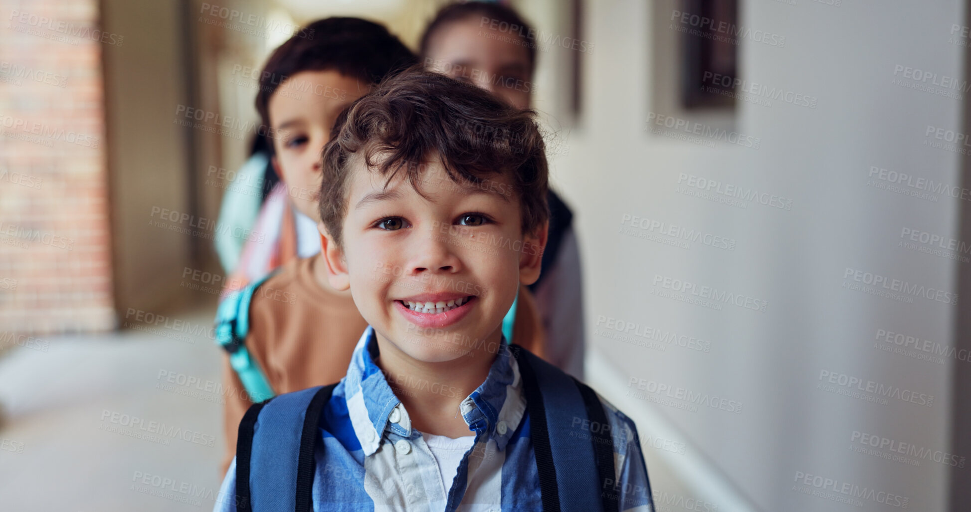 Buy stock photo Hallway, portrait and boy with students, school and education with happiness, smile and learning. Lobby, face and kids with knowledge, child development and friends with bonding, joy and cheerful