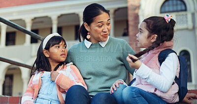 Buy stock photo Outdoor, mother and children with backpack after school, bonding together and communication on stairs. Outside, mom and conversation with girls for kindergarten, knowledge and connection with smile 