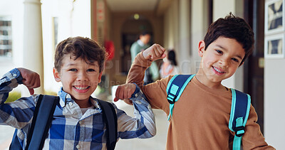 Buy stock photo Kids, flex or portrait and school for education, growth or happy for learning opportunity. Boys, smile or strong gesture in hallway for brain power, energy or showing muscle for knowledge development