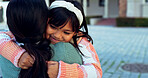 Hug, mama and girl with education, outdoor and smile with support, kindness and happiness. outside, family and single parent with kid, daughter and childhood with embrace, cheerful and mother