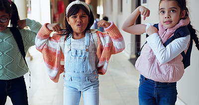 Buy stock photo Children, flex and strong at school for education, growth and excited for learning opportunity. Girls, portrait or strength in academy for brain power, energy or show muscle for knowledge development