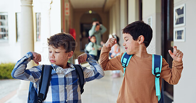 Buy stock photo Kids, flex and strong at school for education, growth and confident for learning opportunity. Boys, strength or wellness gesture in hallway for brain power, energy or muscle for knowledge development