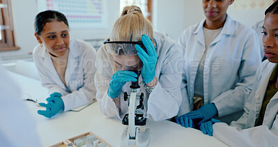 Buy stock photo High school, students and microscope in science classroom for chemistry analysis, sample study or practical lesson. Girl, people and learning of medical research for experiment with ppe safety in lab