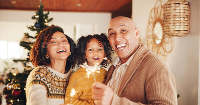 Buy stock photo Christmas, portrait and happy with family and sparkler for festive magic, Noel cheer and xmas celebration. Love, winter holiday and decorations with people at home for present, vacation or excited
