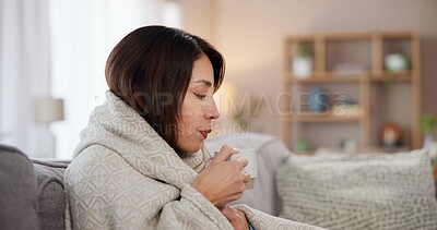 Buy stock photo Sick, home and tea of woman with cold, flu and illness with blanket for wellness and health problem on sofa. Living room, coffee and hot drink with covid virus or allergy with rest and mug to relax