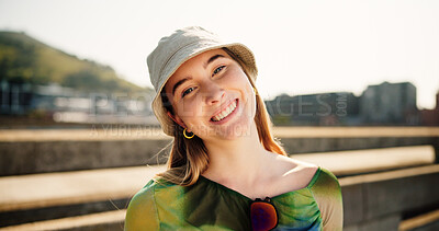 Buy stock photo City, woman and portrait with smile for fashion, streetwear and confidence for cool clothes with happiness. Urban bridge, female person or cheerful with positive attitude for hipster, trendy and hat