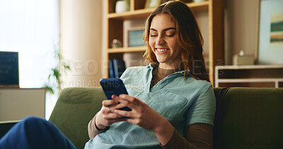 Buy stock photo Smile, girl and relax with phone on couch for communication, social media and notification update. Happy, woman and mobile for reading message, online chat and texting of entertainment game at house