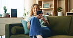 Happy, woman and relax with phone on couch for communication, social media and notification update. Smile, girl and mobile for reading message, online chat and texting of entertainment game at house