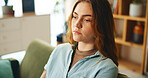 House, depression and woman on sofa, sad and decision with anxiety, lonely and mental health. Apartment, person and girl on couch, stress and doubt with fatigue, tired and confused with burnout