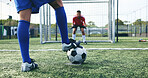 Legs, match and player with ball, goalkeeper and free kick in soccer, field and fitness with games. Outdoor, playing and feet for football, training and practice for competition, health and people