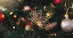Ornaments, tree and decoration for Christmas, sparkle and tradition for festive, color and bright with lights. Creative, holiday and season of celebration, home and detail on ball,  shiny and lounge