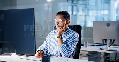 Buy stock photo Man, computer and reading at night in office for project review, decision and thinking at media company. Person, writer or editor by pc with problem solving, ideas and feedback at creative agency