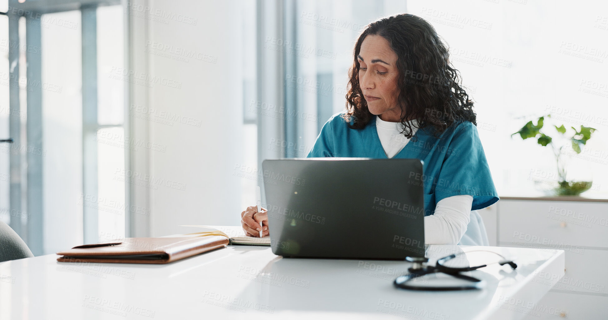 Buy stock photo Hospital, nurse and woman with laptop, writing and thinking with research, online reading and results. Person, medical or professional with computer, doctor or digital app with internet or connection