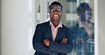 Arms crossed, glasses and portrait with business black man at window in office for confidence or professionalism. Ambition, mission and smile with happy corporate employee in workplace for career