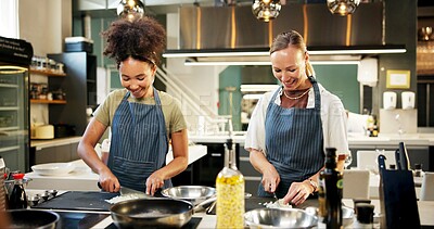 Buy stock photo Culinary, chef and women in kitchen, cooking and preparation of meal, food and tutorial in hospitality. Process, apprentice and learning in restaurant, students and course in fine dining and talent