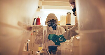 Buy stock photo Drugs, people and gas mask in lab for production of illegal substances, narcotics and crystal meth. Basement crime, hazmat suit and powder with compound mixture for cooking cocaine and manufacturing