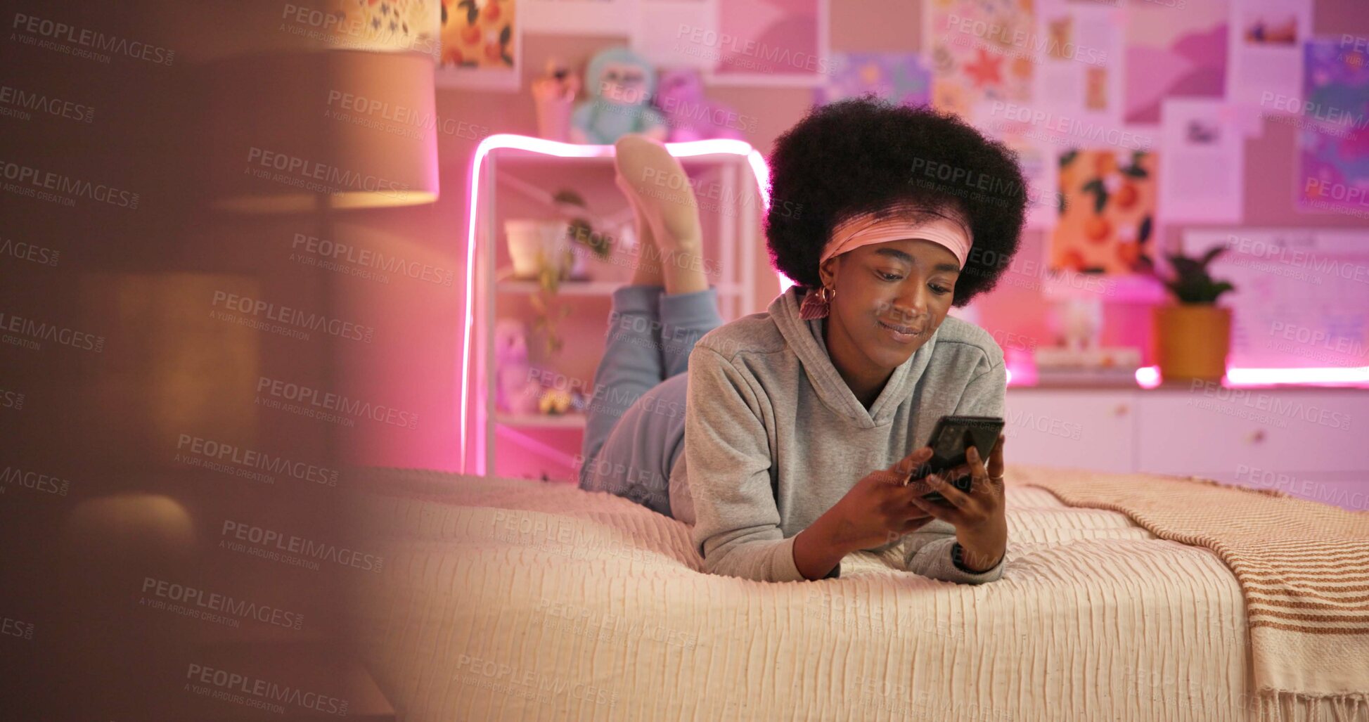 Buy stock photo Woman, student and scroll with cellphone in home, bedroom or apartment with internet communication. Smartphone, browse and video on social media with girl typing in chat online relaxing on bed