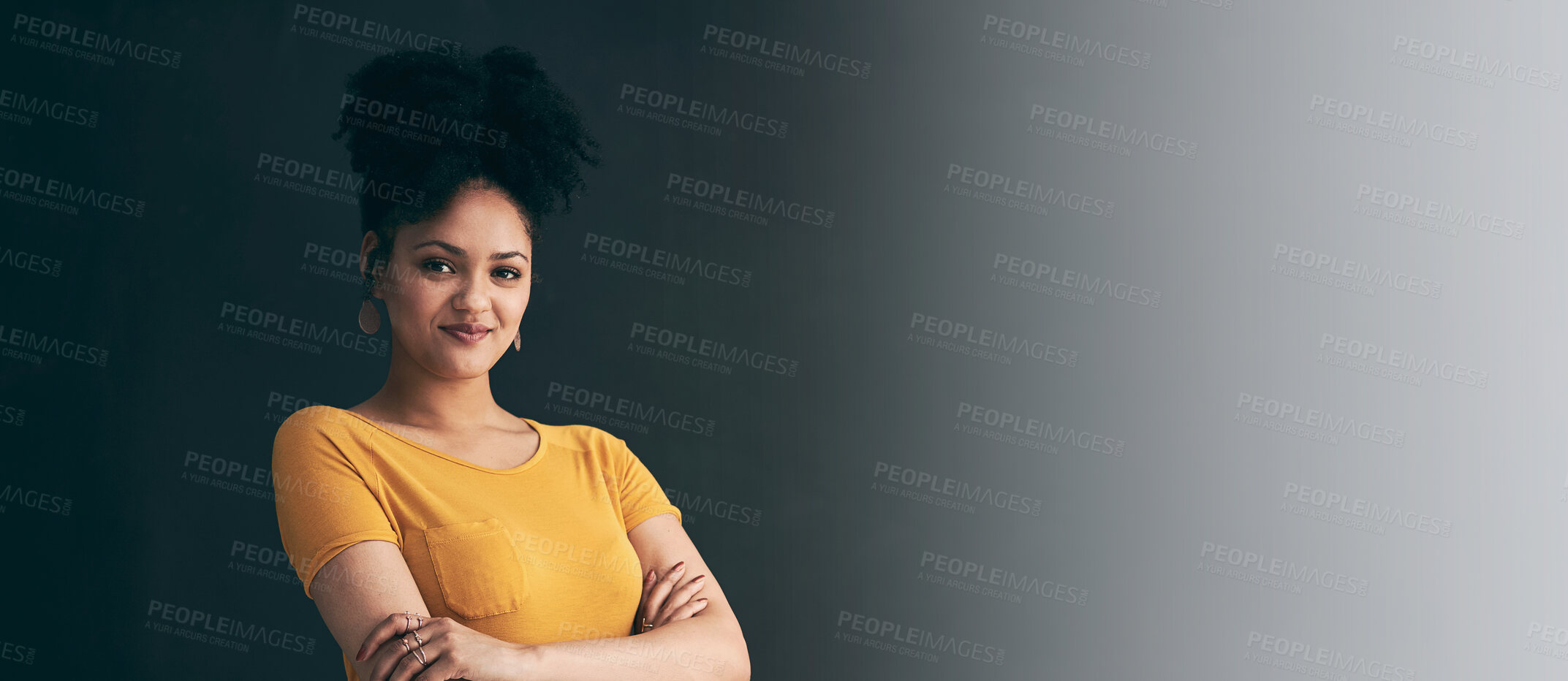 Buy stock photo Shot of a young woman posing against a grey background