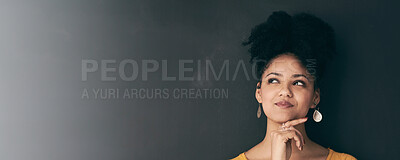 Buy stock photo Shot of a woman posing with a chalk illustration of a airplane taking off against a dark background