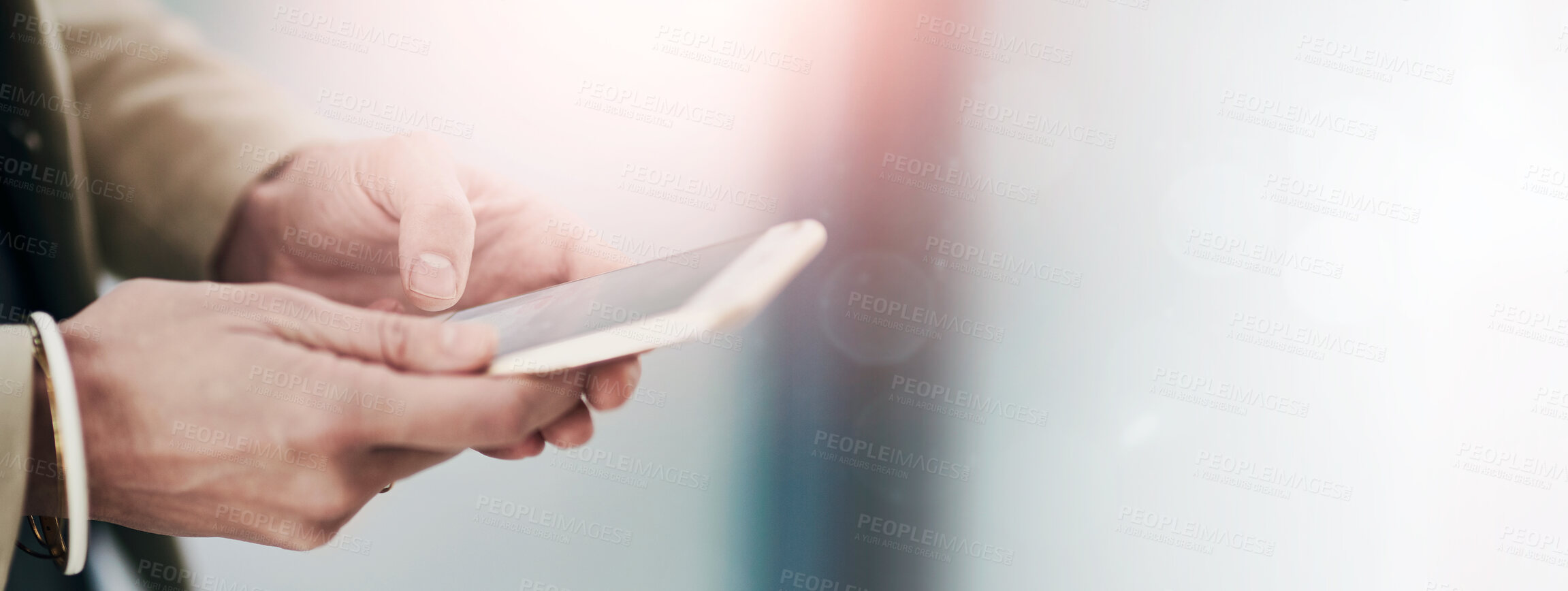 Buy stock photo Cropped shot of an unidentifiable businesswoman using her smartphone in the office