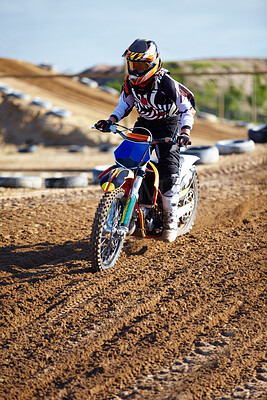 Buy stock photo Adventure, offroad and biker riding a motorcycle with speed for a race or sport competition. Sports, fitness and male athlete on motorbike for adrenaline, training or practicing on outdoor dirt trail