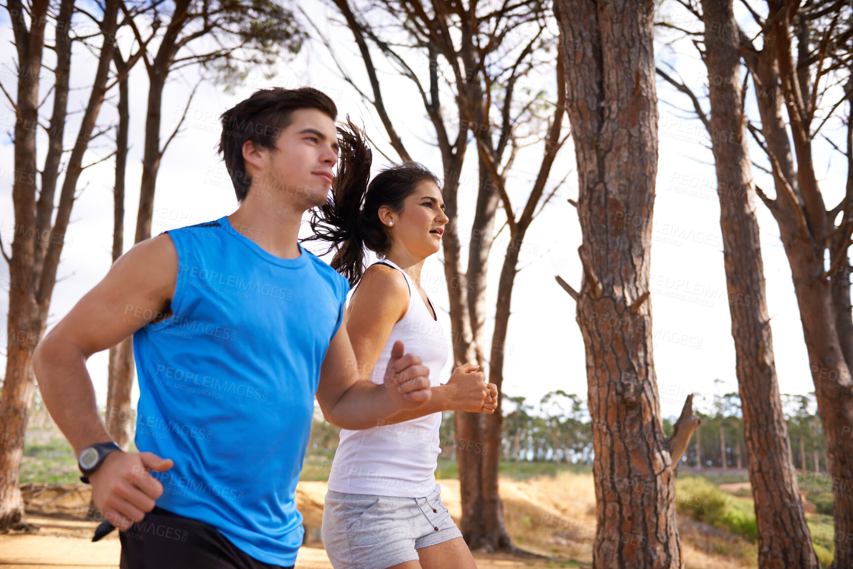 Buy stock photo Fitness, forest or couple in nature running for exercise, training or outdoor workout together. People, fast runners or athletes at a park for sports endurance, wellness or cardio challenge in woods