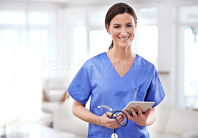 Buy stock photo Cropped shot of a young female doctor holding a tablet