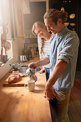 Buy stock photo Morning, happy and couple in kitchen with coffee in moka pot for caffeine beverage, warm drink and cappuccino. Apartment, home and man and woman with prep on counter for breakfast, aroma and espresso