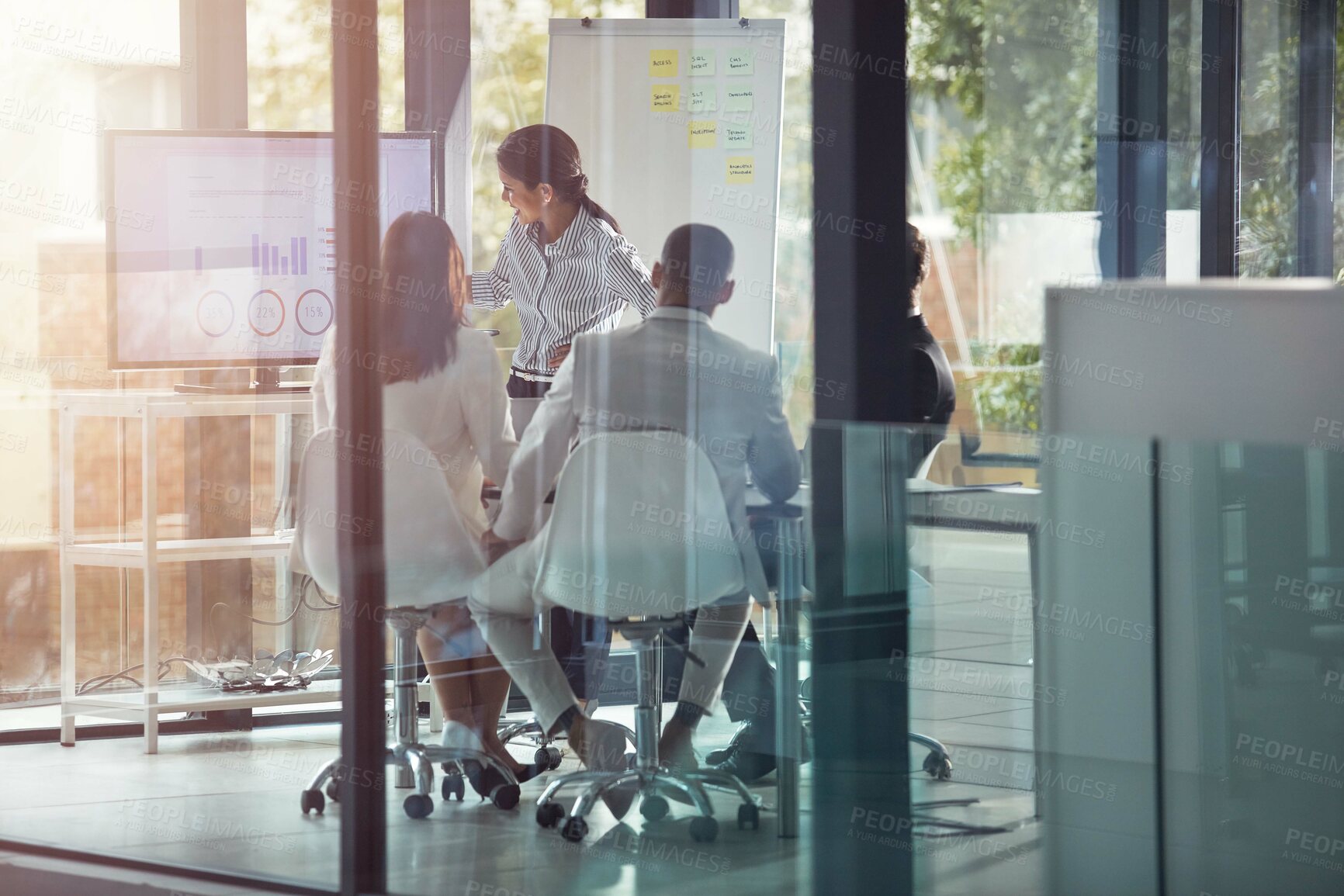 Buy stock photo Shot of a businesswoman giving a presentation in the boardroom