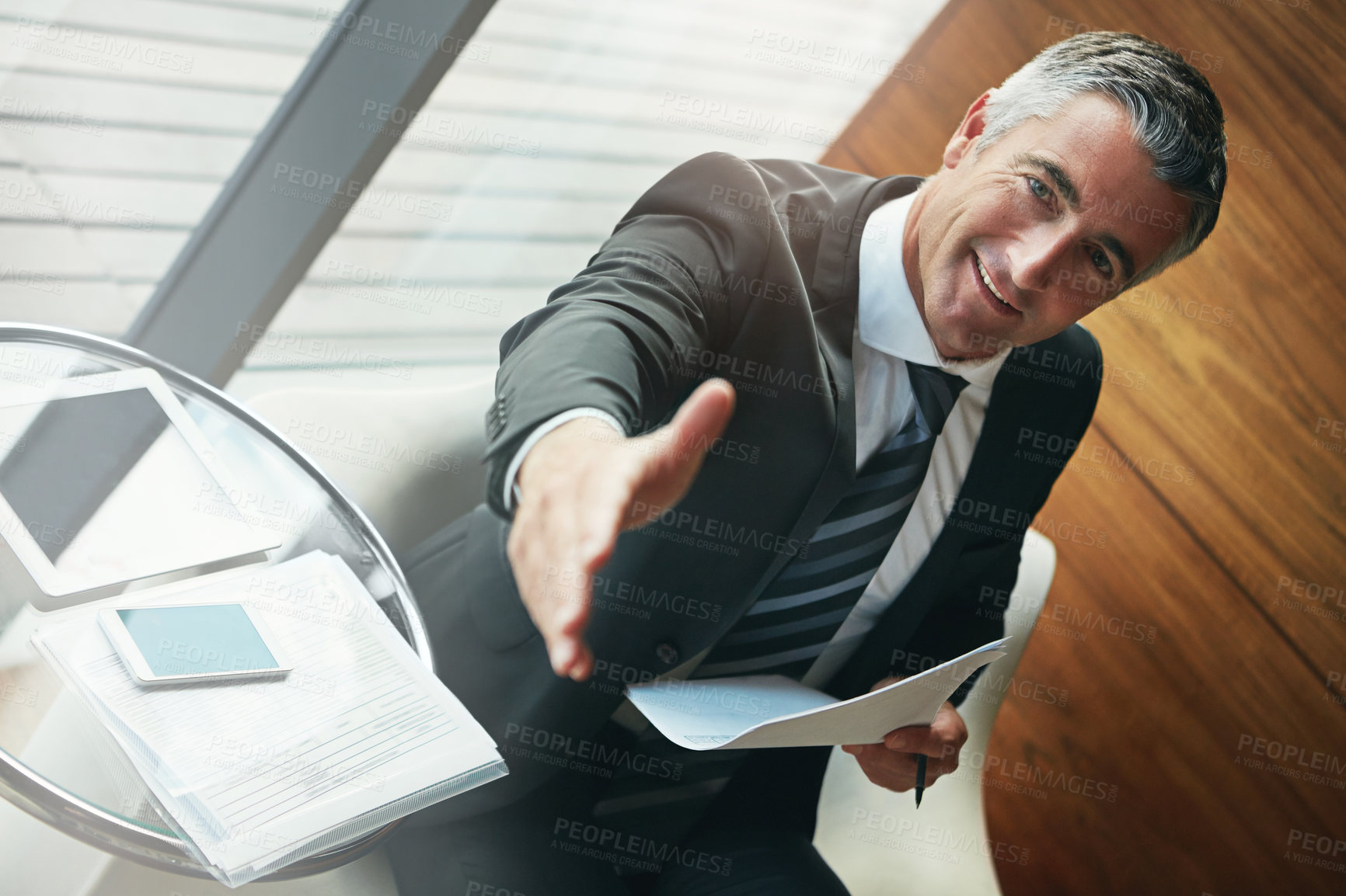 Buy stock photo Happy, portrait or businessman with handshake for meeting, deal or contract agreement at office. Mature, man or financial advisor shaking hands with smile for b2b, partnership or corporate settlement