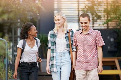 Buy stock photo Walking, talk and young students at university planning for study, assignment or test with scholarship. Networking, discussion and young women with bags bonding and conversation at college campus.