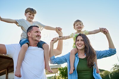 Buy stock photo Parents, children and airplane on shoulders, playful and happy with holding hands, love and summer. Mother, father and kids with play, flight and piggy back with smile in garden with game in Spain