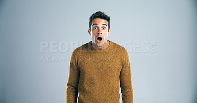 Buy stock photo Wow, man and surprised with portrait in studio for bad news, secret announcement and gossip story. Person, face and shocked expression on mockup space for drama or fake information on gray background