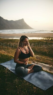 Buy stock photo Woman, yoga and meditation at beach for fitness, balance and calm with healthy mind or third eye. Female person, yogi and exercise in nature for health, chakra or zen with mindfulness or inner peace