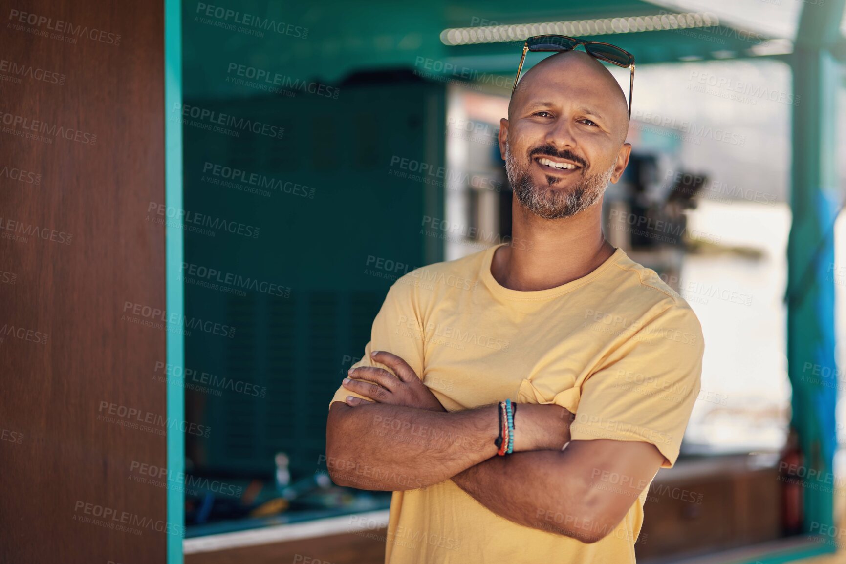 Buy stock photo Man, portrait and smile by cafe for holiday in city, freedom or adventure travel for wellness. Male tourist, outdoor and relax on vacation with happiness in Canada, sunshine for health by coffee shop