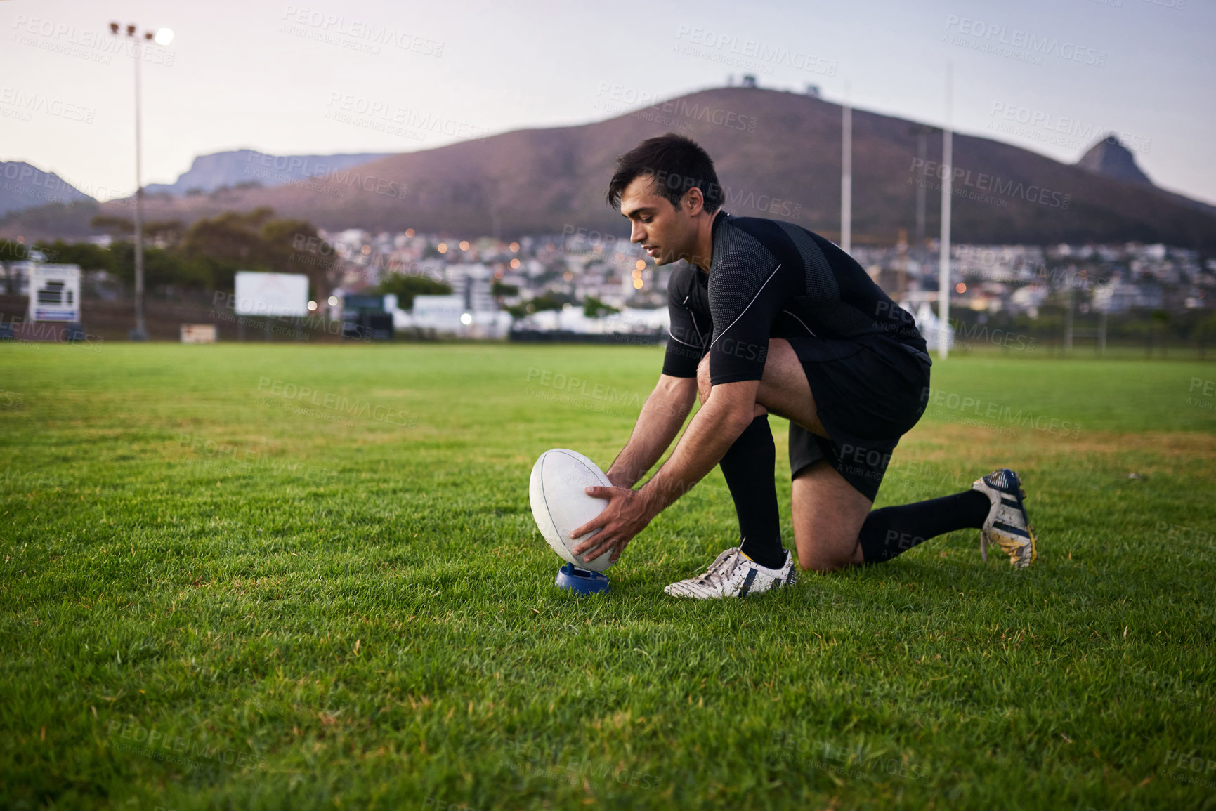 Buy stock photo Rugby, competition and man with ball, outdoor and performance for practice, game and fitness for athlete. Playground, grass and professional with strength, player and training for football and person