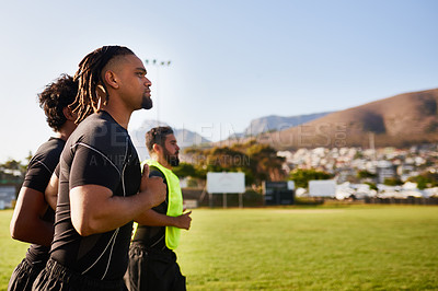 Buy stock photo Running, people and outdoor for rugby warm up, community workout and group for sports. Men, performance and professional athletes together for training, practice and fitness to prepare for games