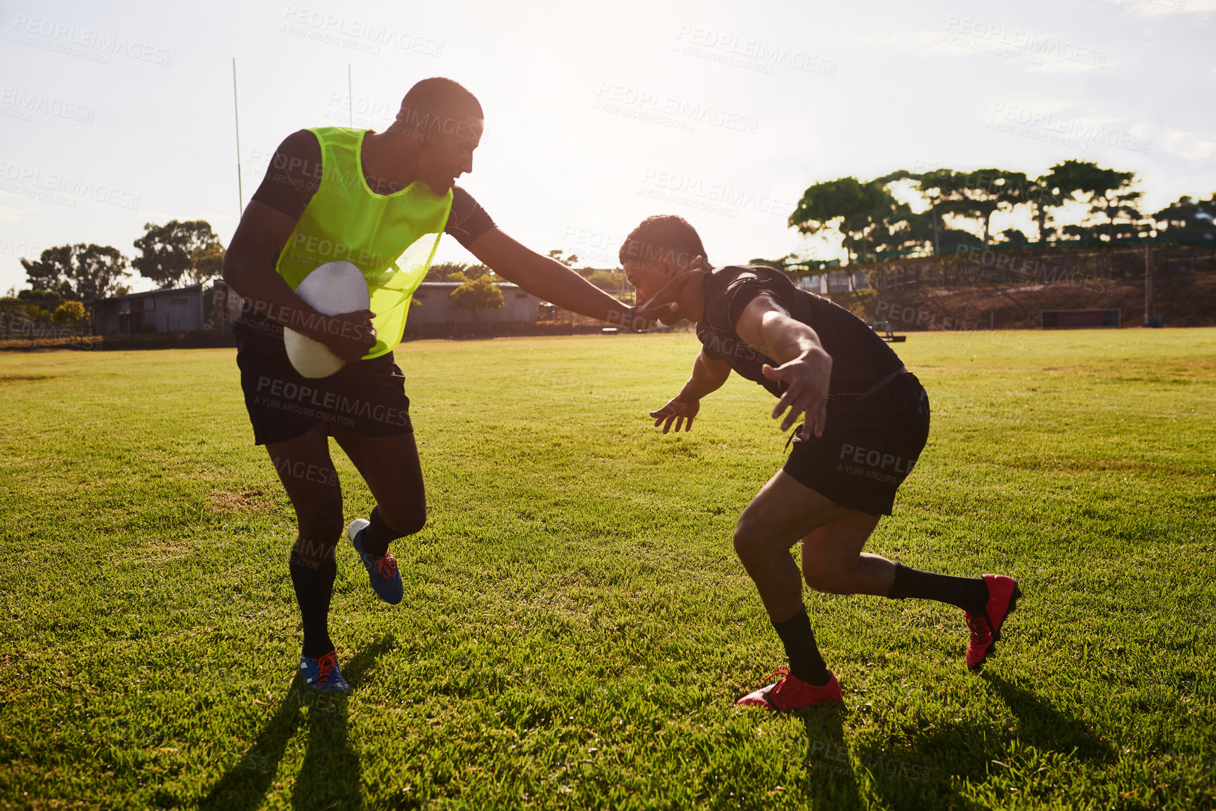 Buy stock photo Practice, rugby and men tackle for ball on field for match, fitness and game in tournament competition. Team, running and players playing sports on pitch for defense exercise, training or performance