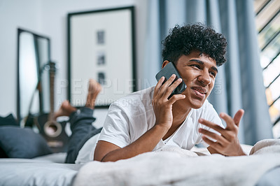 Buy stock photo Man, relax and phone call for talking at house with contact, networking and morning routine. Smile, male person and mobile for discussion, listening to gossip and communication of internet in bedroom