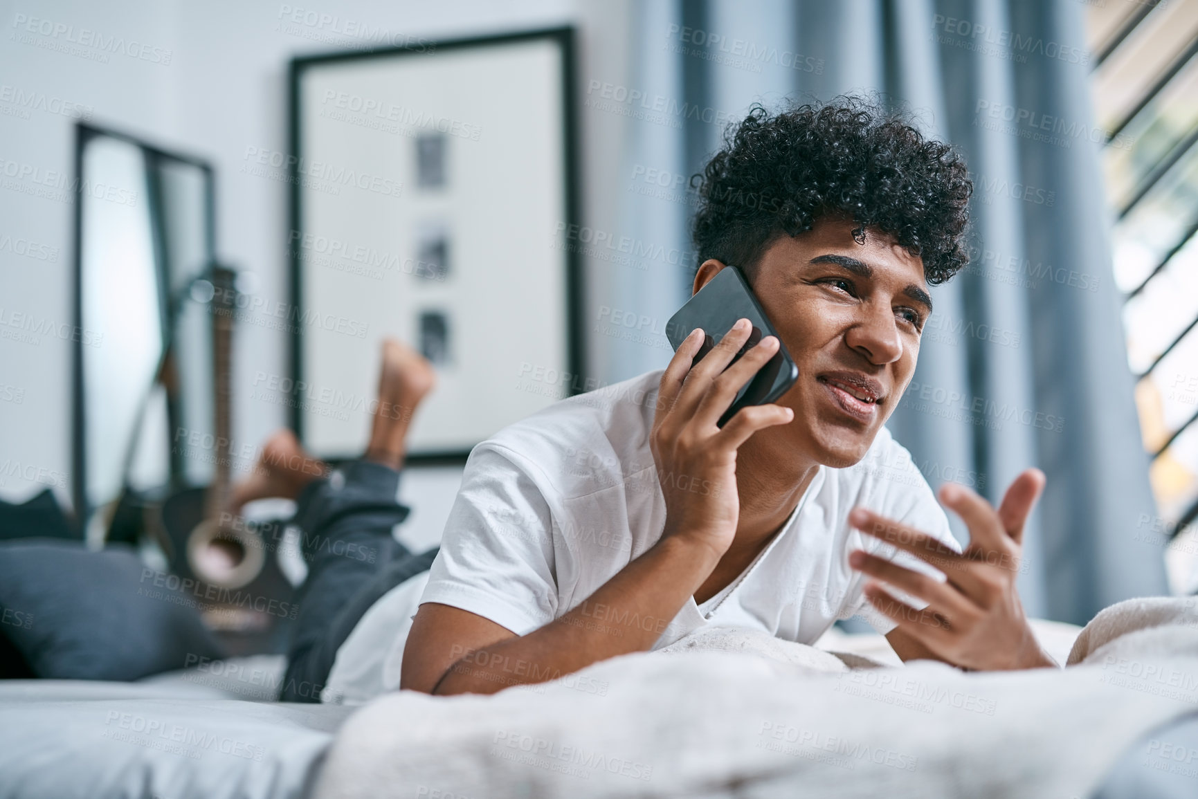 Buy stock photo Man, relax and phone call for talking at house with contact, networking and morning routine. Smile, male person and mobile for discussion, listening to gossip and communication of internet in bedroom