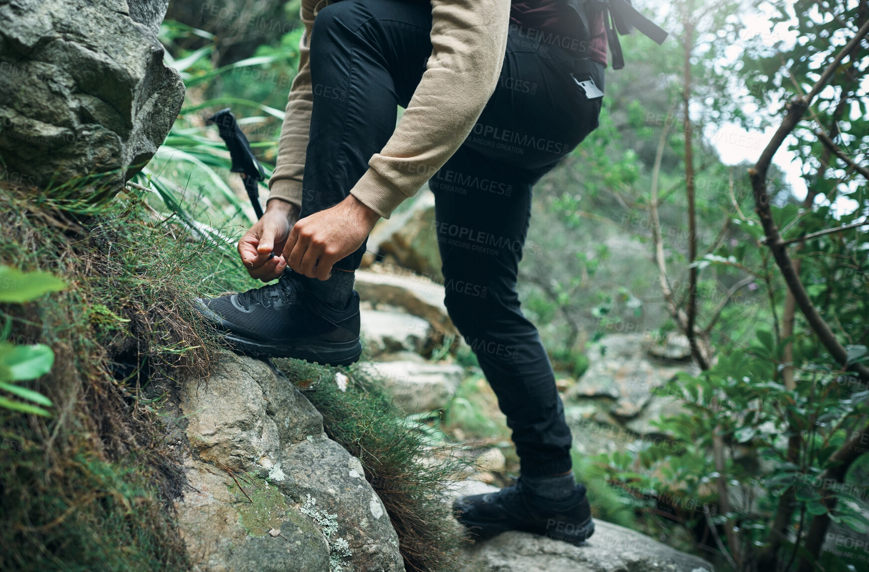 Buy stock photo Hiking, shoes and tying laces with person in nature for explore, health and adventure. Challenge, wellness and holiday with closeup trekking on path for walking, fitness and camping vacation