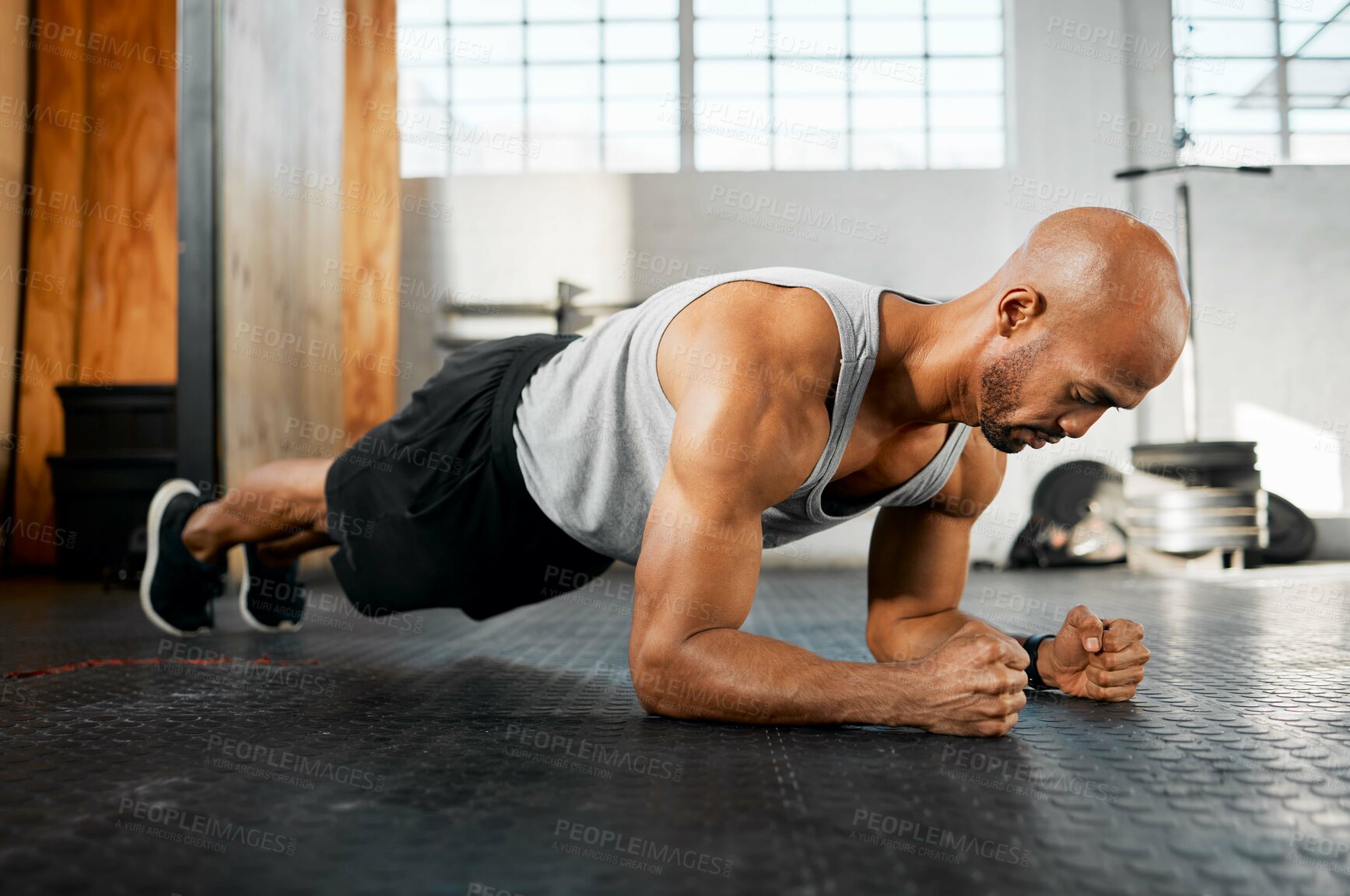 Buy stock photo Man, workout or plank with floor at gym for core exercise, abdominal fitness or strength. Active, muscular or male person with intense training or routine for strong abs or muscle gain at health club